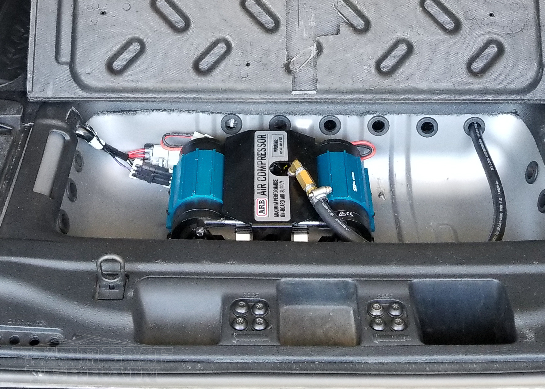 2016 4-door JK with an ARB Air Compressor in the Trunk