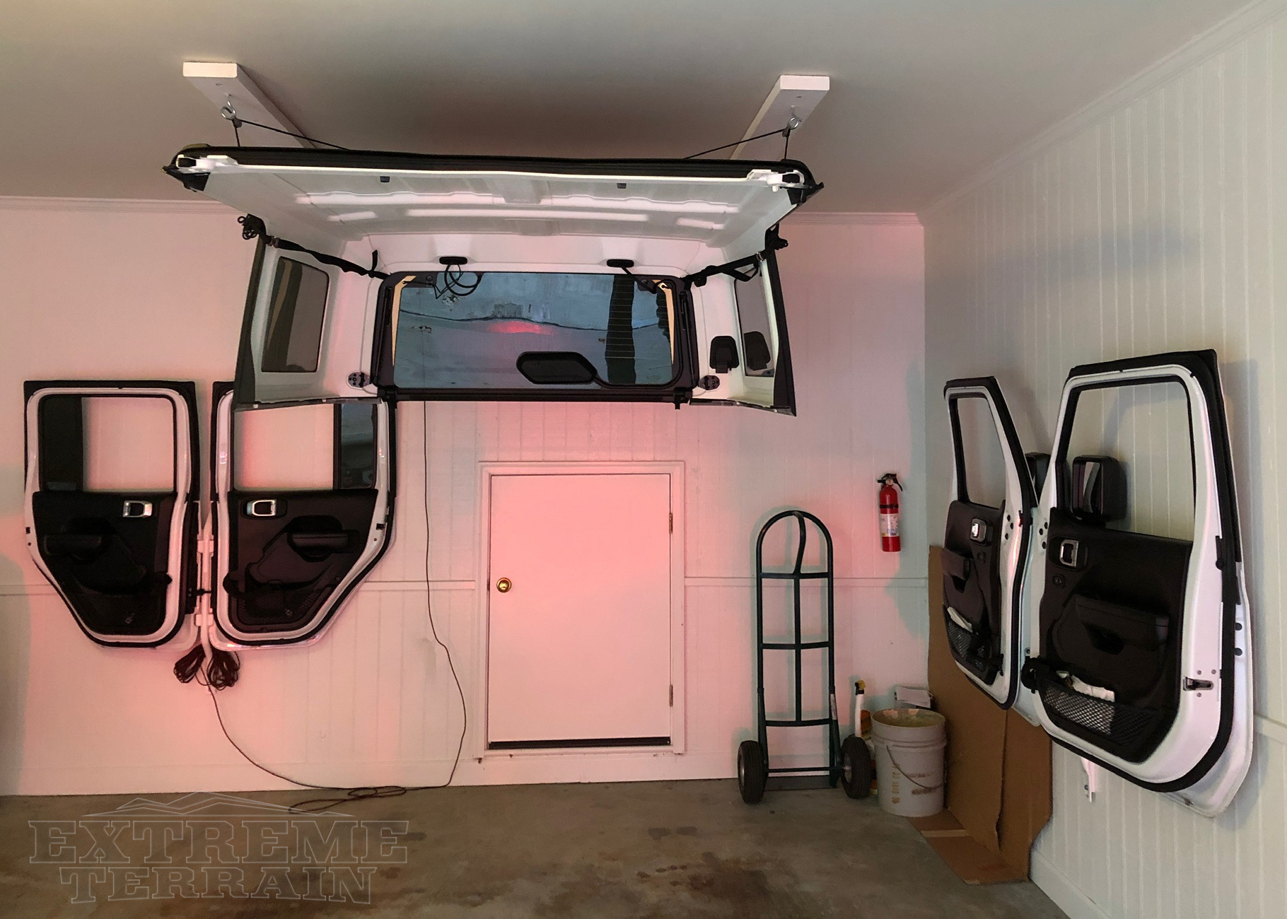 2018 4-Door Wrangler Hardtop Hoisted with Doors in a Garage